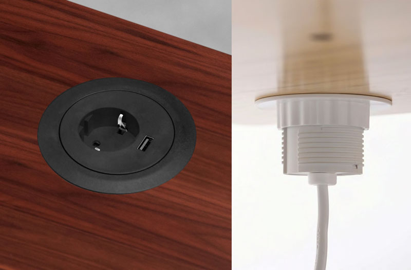 Över- och underifrånvy av en genomföring i ett laminatskrivbord i valnöt med ett enda eluttag och USB-anslutning.